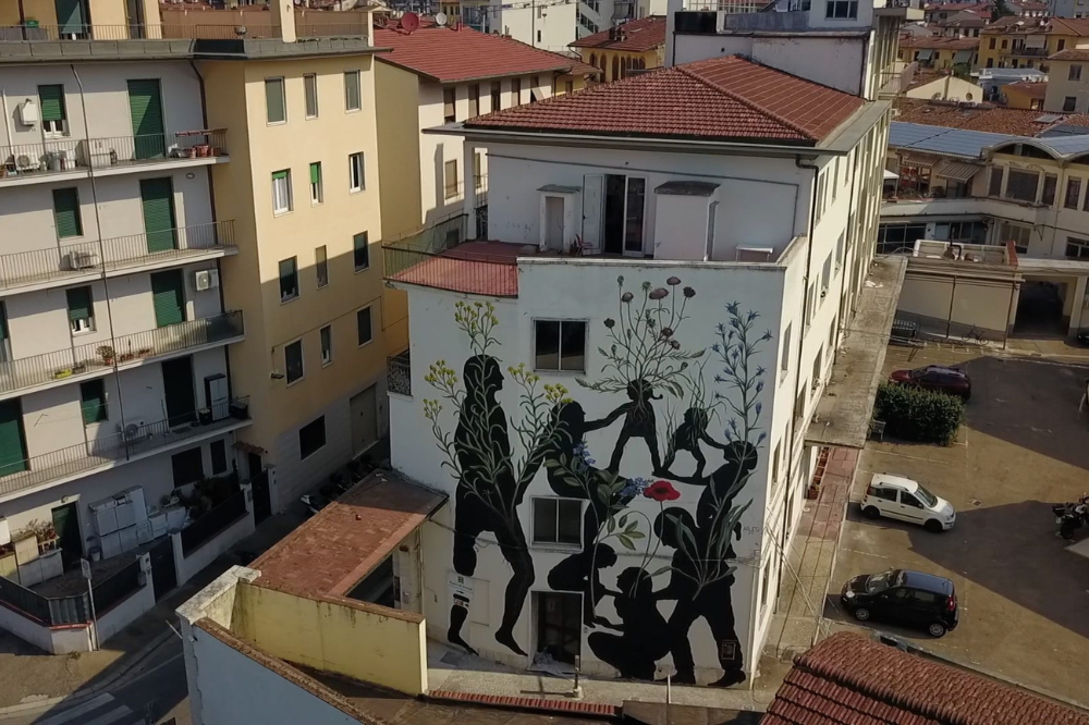 Al centro di accoglienza Luca Misuri un grande murale ispirato alle relazioni umane nate tra gli ospiti
